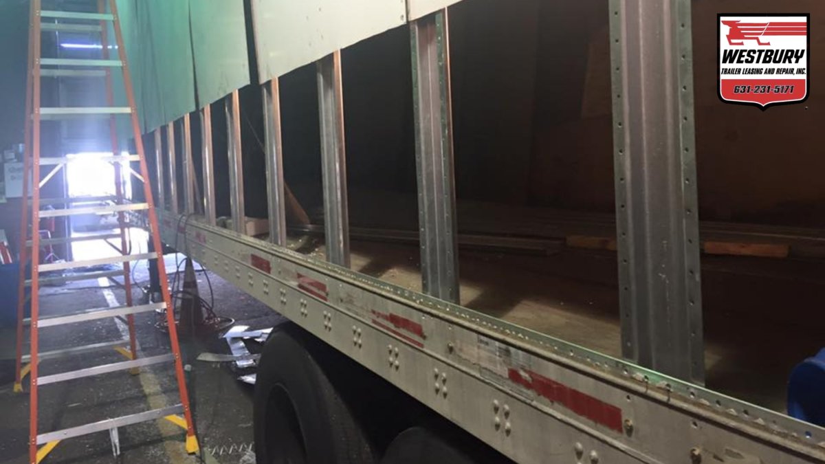 Side of truck trailer getting walls replaced